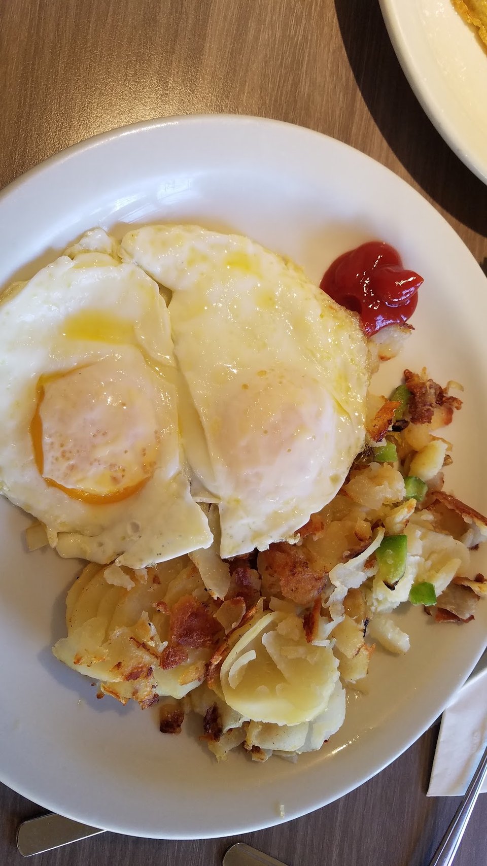 Breakfast menu with omelettes and French toast.